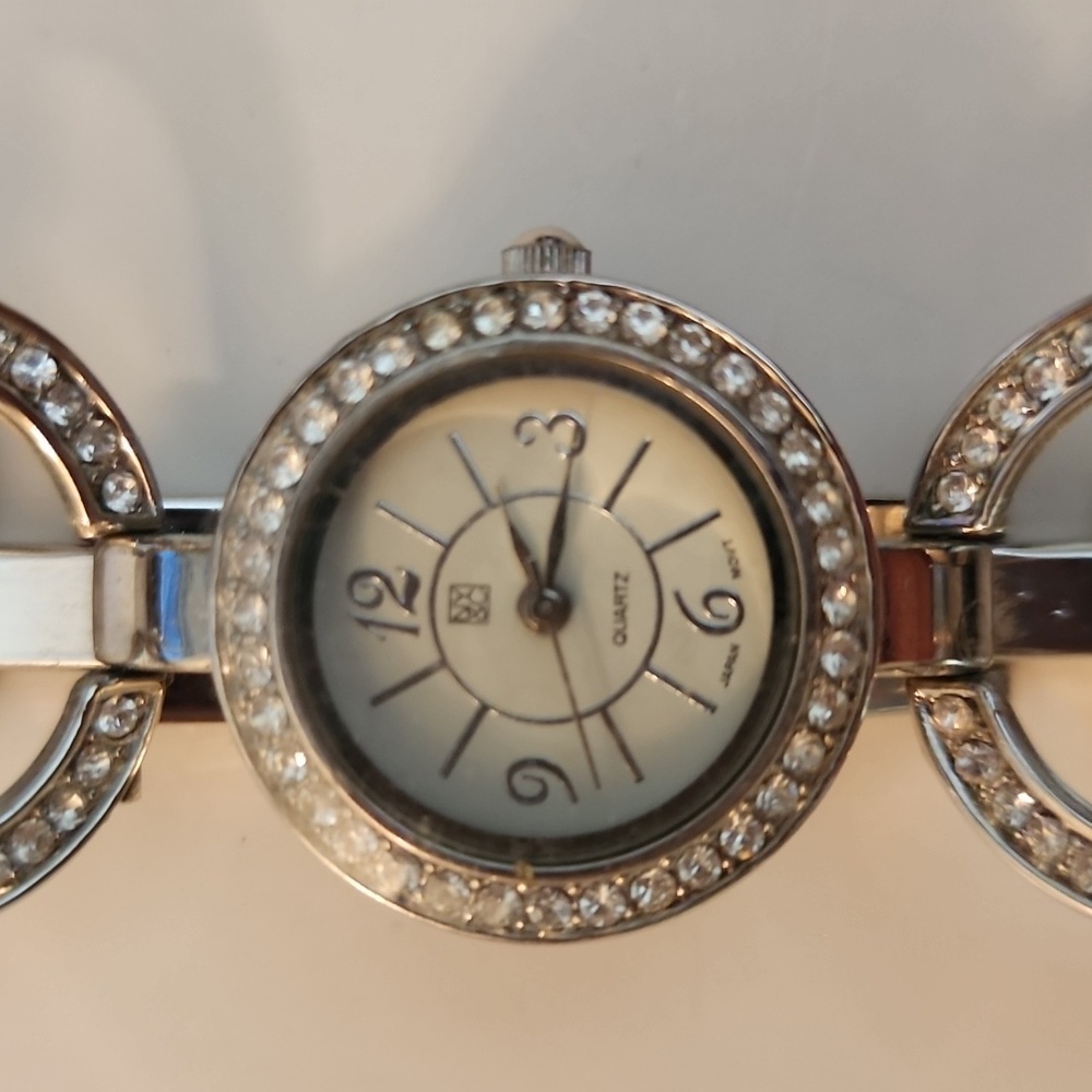 Vintage Women’s NY & Co Analog Silver Tone Bracelet Watch with infinity bracelet